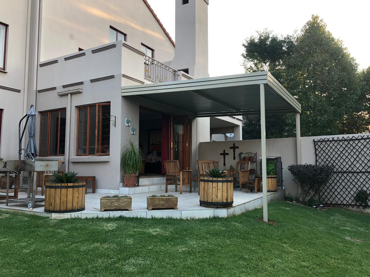 Attached carport installed by Pronet Shadeports and Carports Gauteng