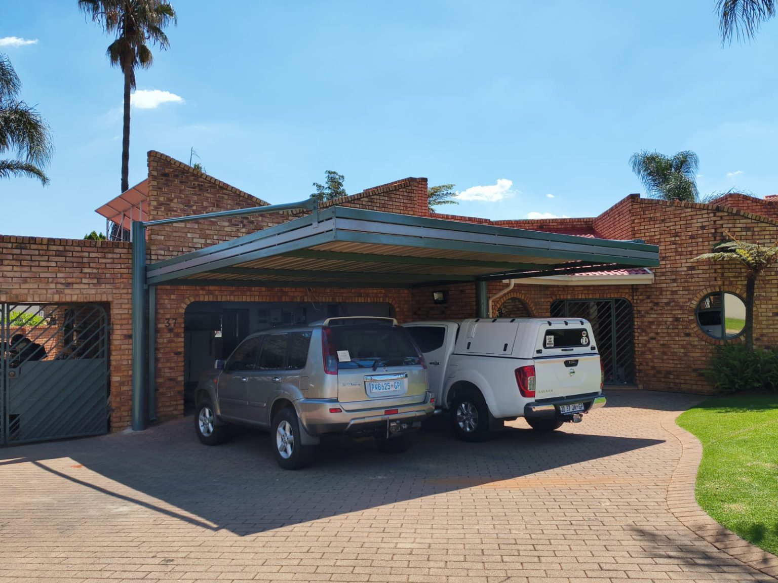 Double steel carport installation for a Kempton Park home